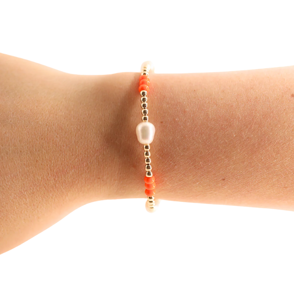 Beaded Blondes orange and Poppi pearl beaded bracelets