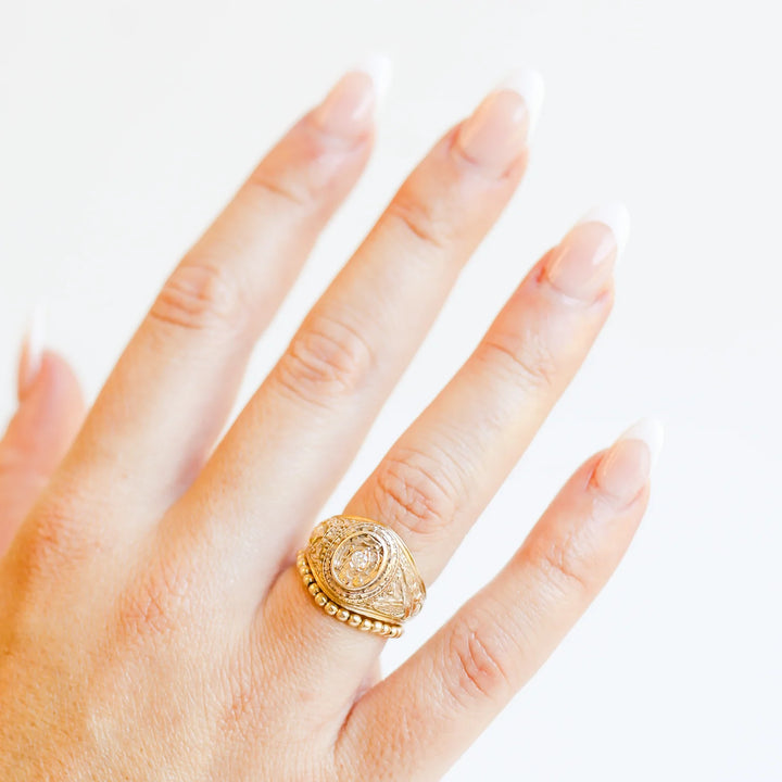 beaded blondes lexi band gold beaded ring shown with class ring