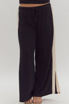 Entro Black ribbed textured knit pants with cream trim