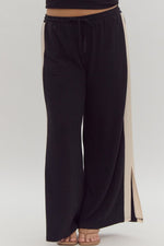 Entro Black ribbed textured knit pants with cream trim