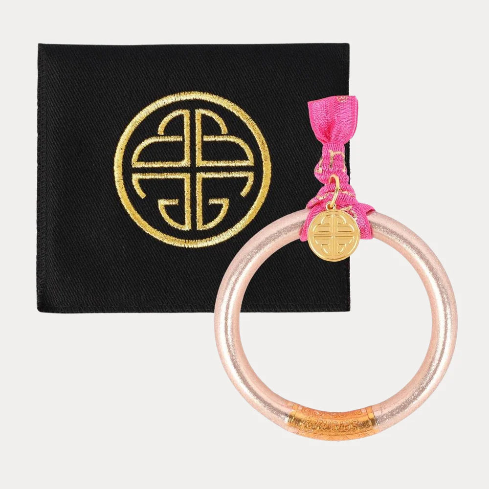 BuDhaGirl Tzubblie single champagne bangle bracelet showing matching bag