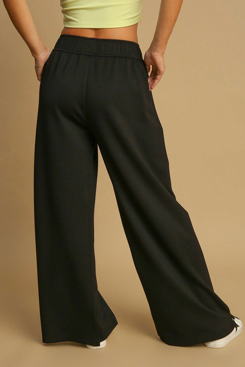 Umgee black scuba luxe knit wide leg pants with cinch drawstring elastic waist