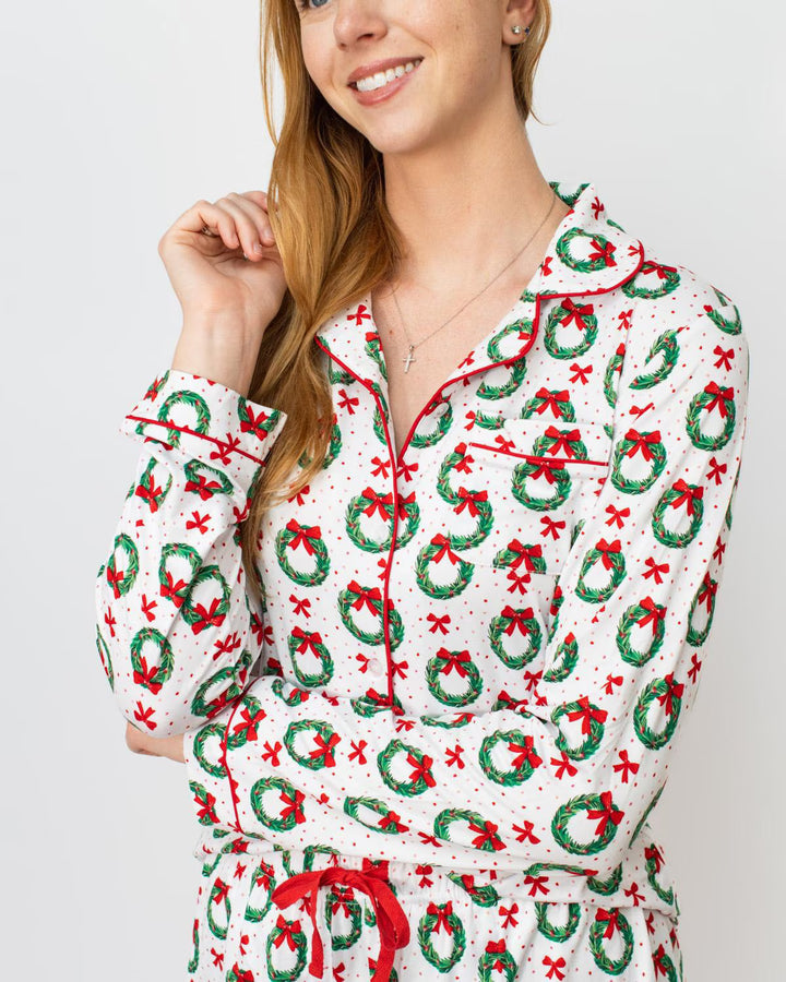 festive pajama top with wreath and bow pattern