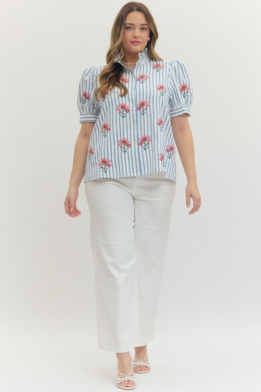 Entro blue and white striped button front top with pink and red embroidered flowers in plus size paired with white pants