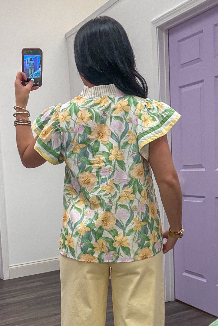  Back view of Women's yellow and green floral printed short sleeve top