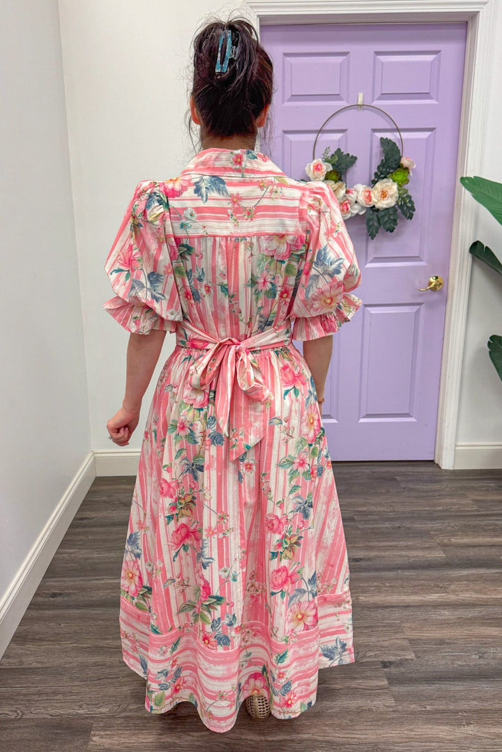 back view of pink stripes and floral midi with self tie belt