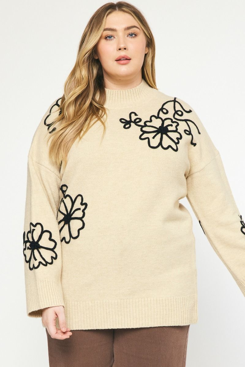 Plus size off white sweater with black stitched floral print