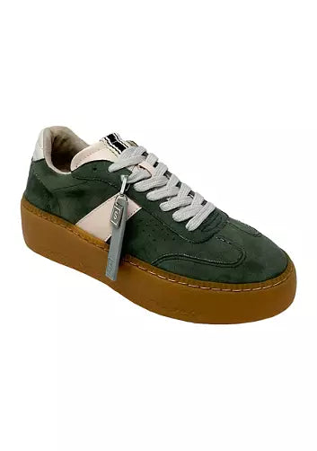 Shu shop Green sneaker with brown sole showing shoe charm
