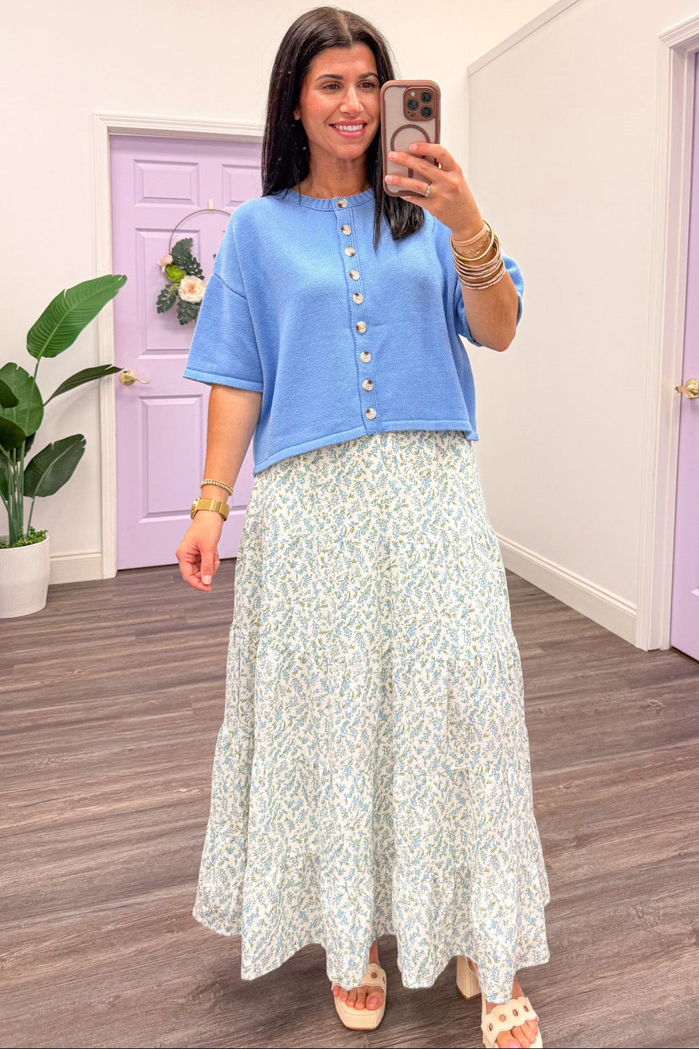 baby blue ribbed crew neckline short sleeve button front knit top