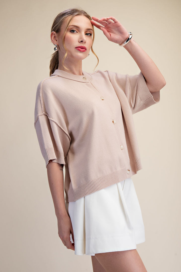 Beige knit top to wear open or buttoned up