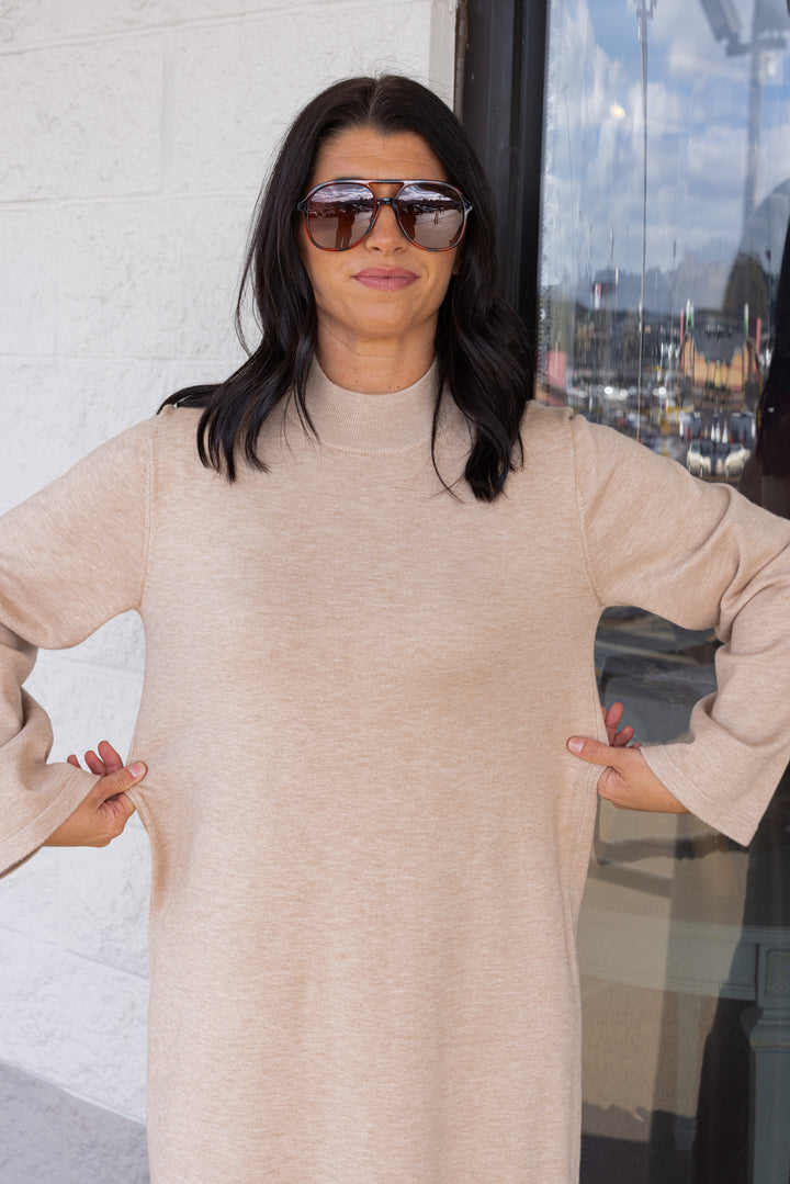 Women's sand beige knit long sleeve midi sweater dress by Entro showing true to size fit