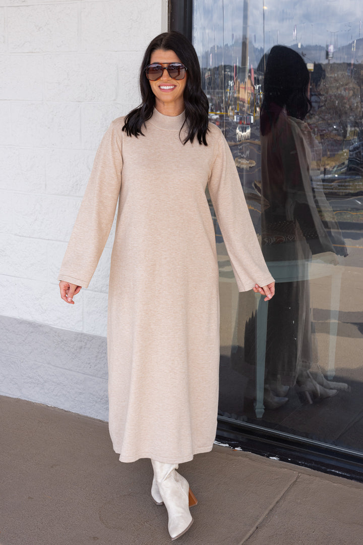 Women's sand beige knit long sleeve midi sweater dress by Entro showing full front view