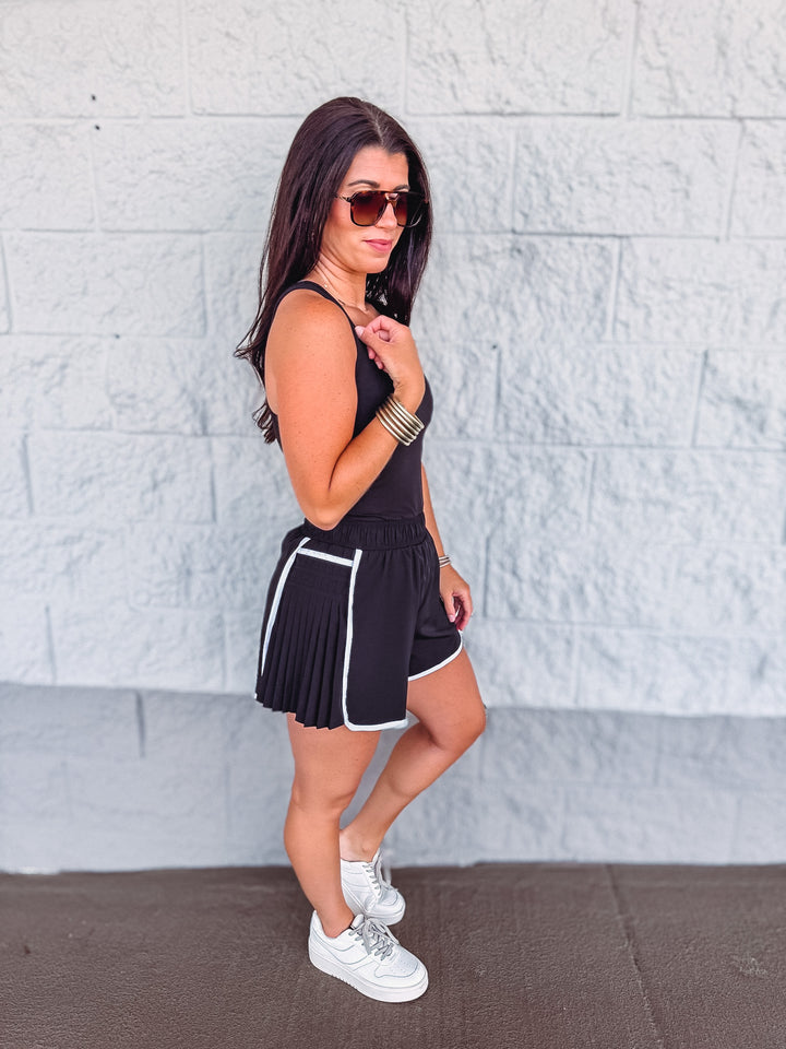 black white activewear romper