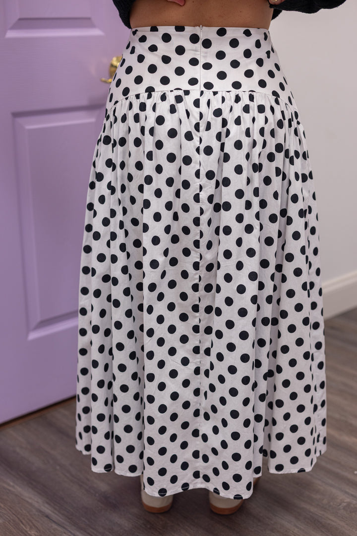 Women's black polka dot maxi skirt by Day + Moon showing up close back view