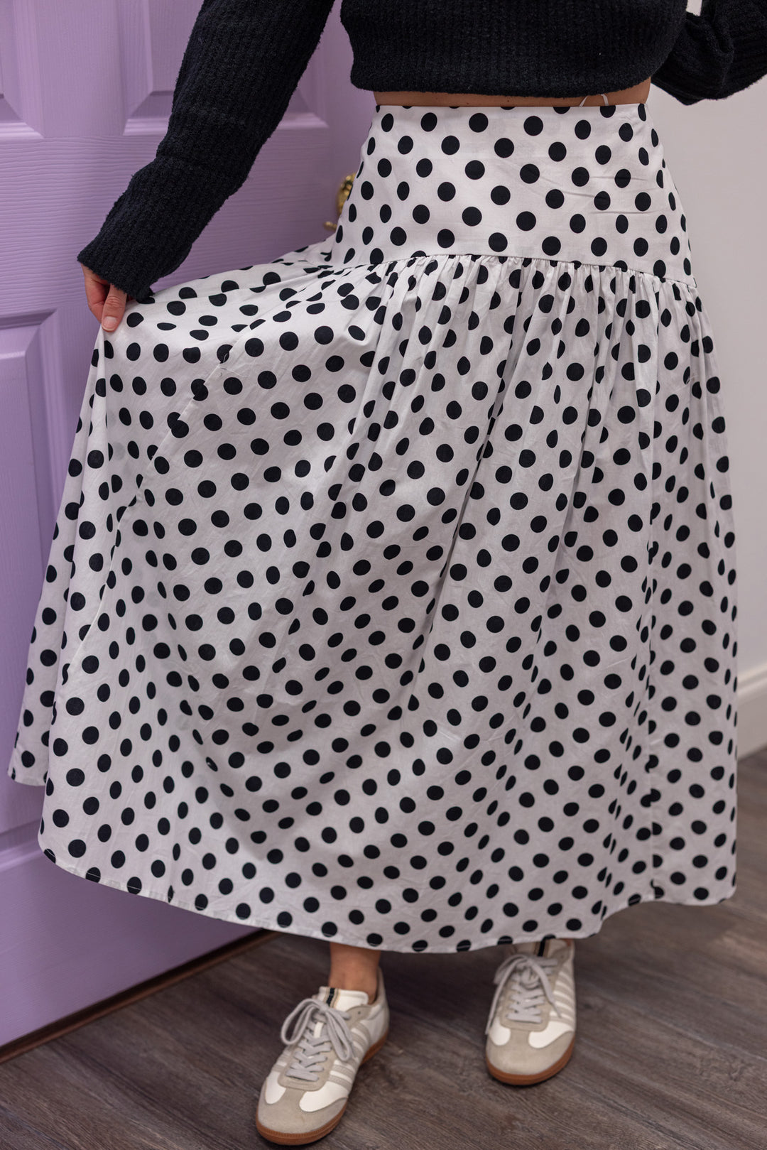 Women's black polka dot maxi skirt by Day + Moon showing up close front view