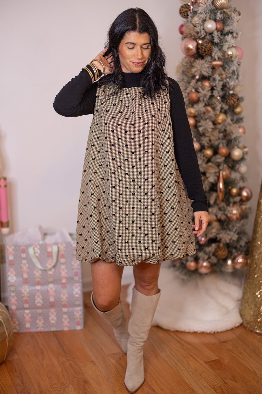 Women's brown, taupe and black gingham bubble hem dress with black bow ties by Glam, perfect for holiday gatherings