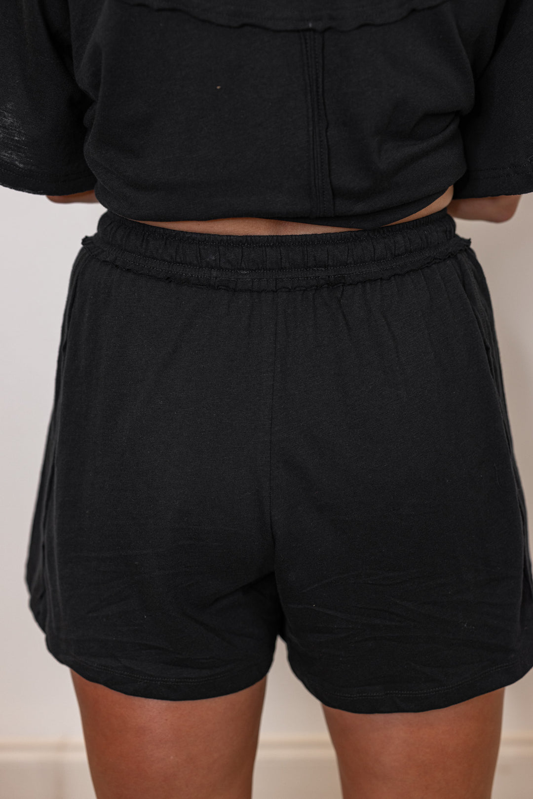 Black cotton slub knit shorts and top set by Rae Mode showing up close back view of shorts