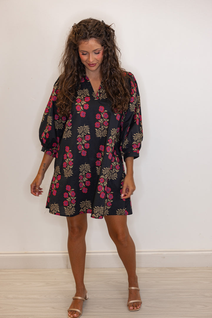 Women's black and magenta floral mini dress with v neck detail