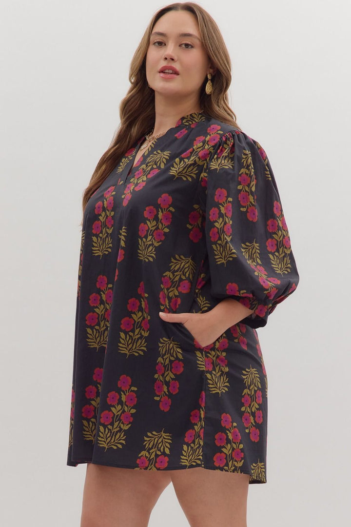 Women's black, burgundy and olive floral print dress by Entro in plus showing slight side view