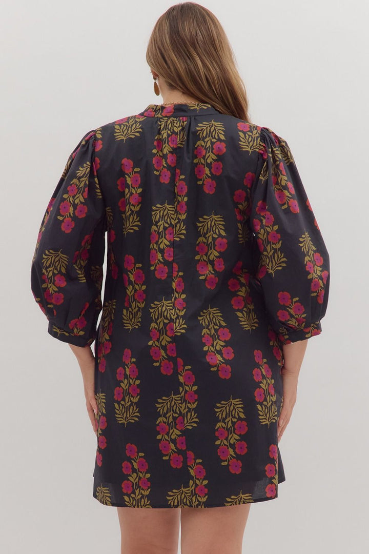 Women's black, burgundy and olive floral print dress by Entro in plus showing back view