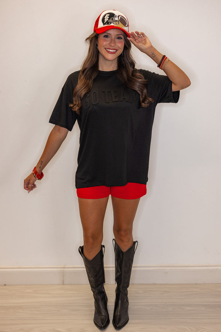 Women's black lightweight top with embossed 'Go Team' in center by Jess Lea showing full front view