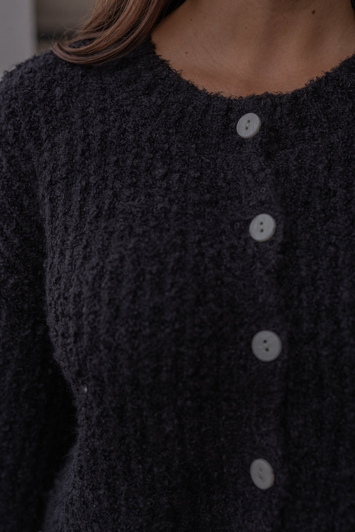 Women's black fuzzy knit textured button front sweater cardigan by hyfve showing up close front view