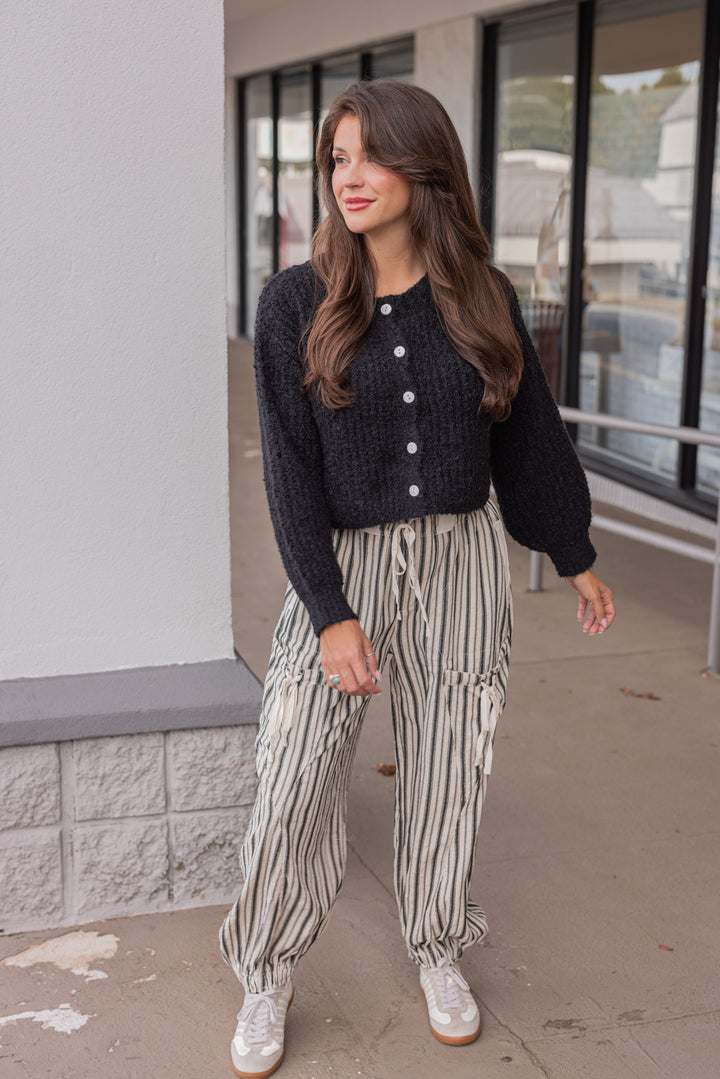 Women's oatmeal linen cargo jogger pants with black stripes by ee:some showing full front view