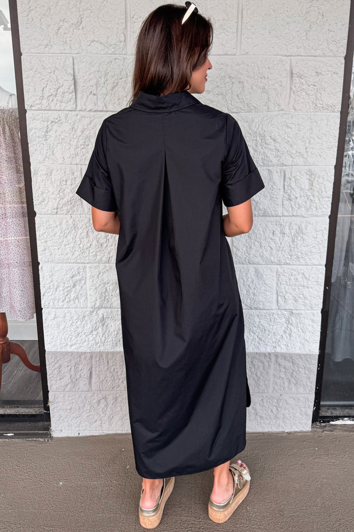 solid black with gold decorative bodice buttons short sleeve midi dress back view