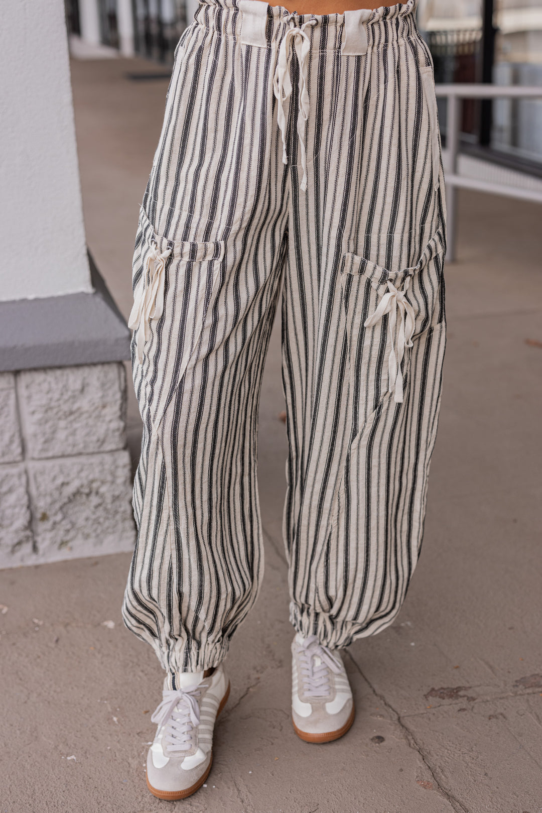 Women's oatmeal linen cargo jogger pants with black stripes by ee:some