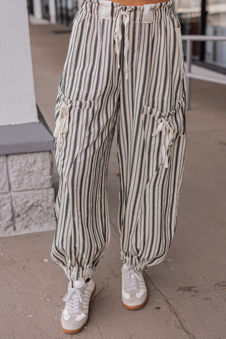 Women's oatmeal linen cargo jogger pants with black stripes by ee:some