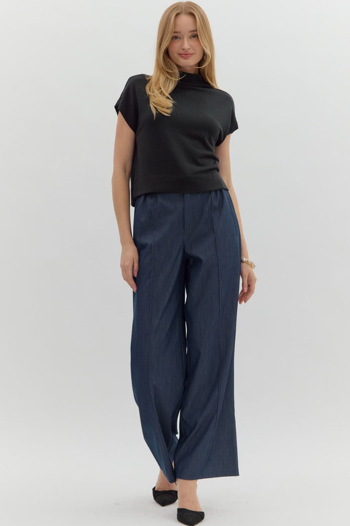 Women's black knit cropped top by Entro showing full front view