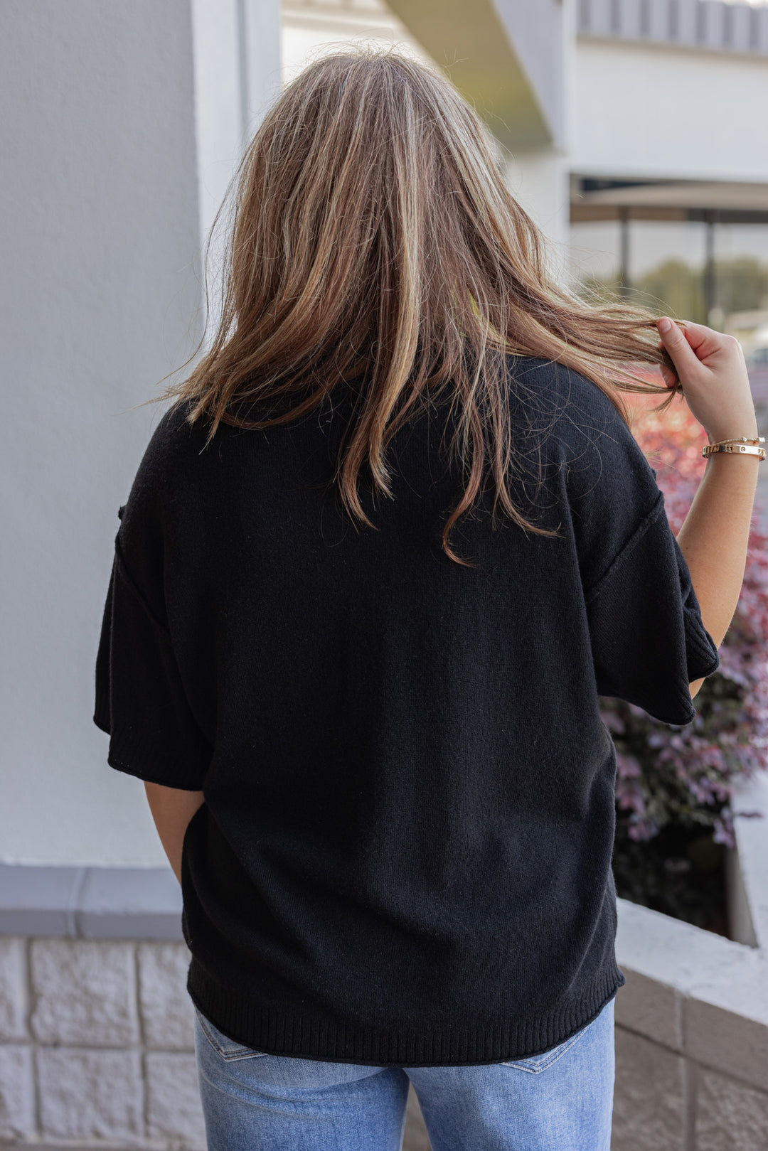 Wome’s staple sweater top black by Jodifl showing up close back view