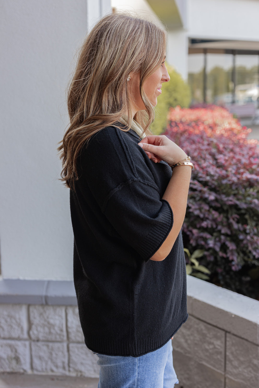 Wome’s staple sweater top black by Jodifl showing up close side view