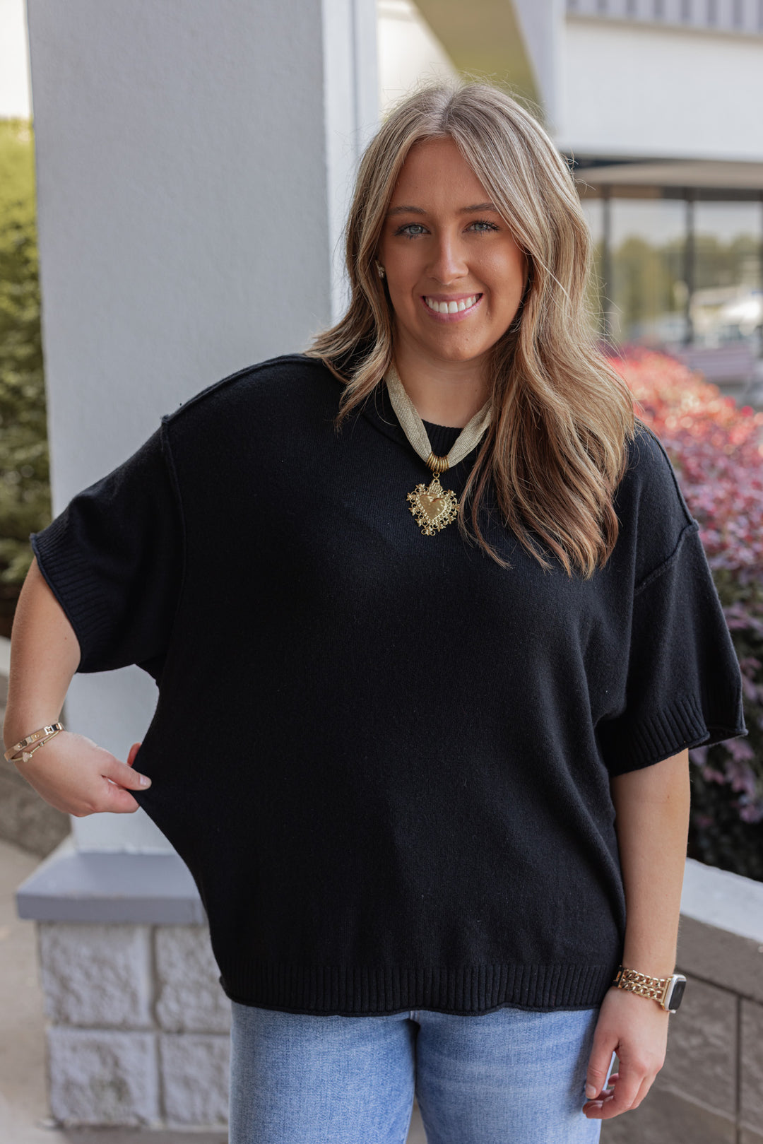 Wome’s staple sweater top black by Jodifl showing relaxed fit