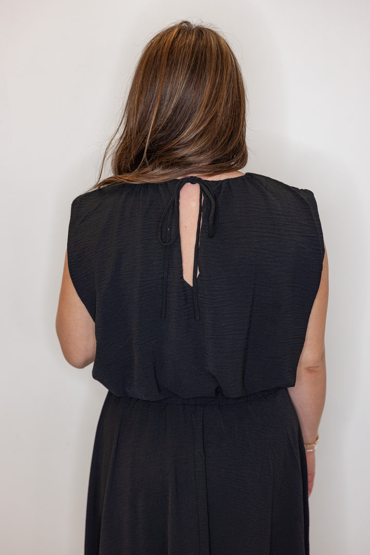 dressy black bubble hem top