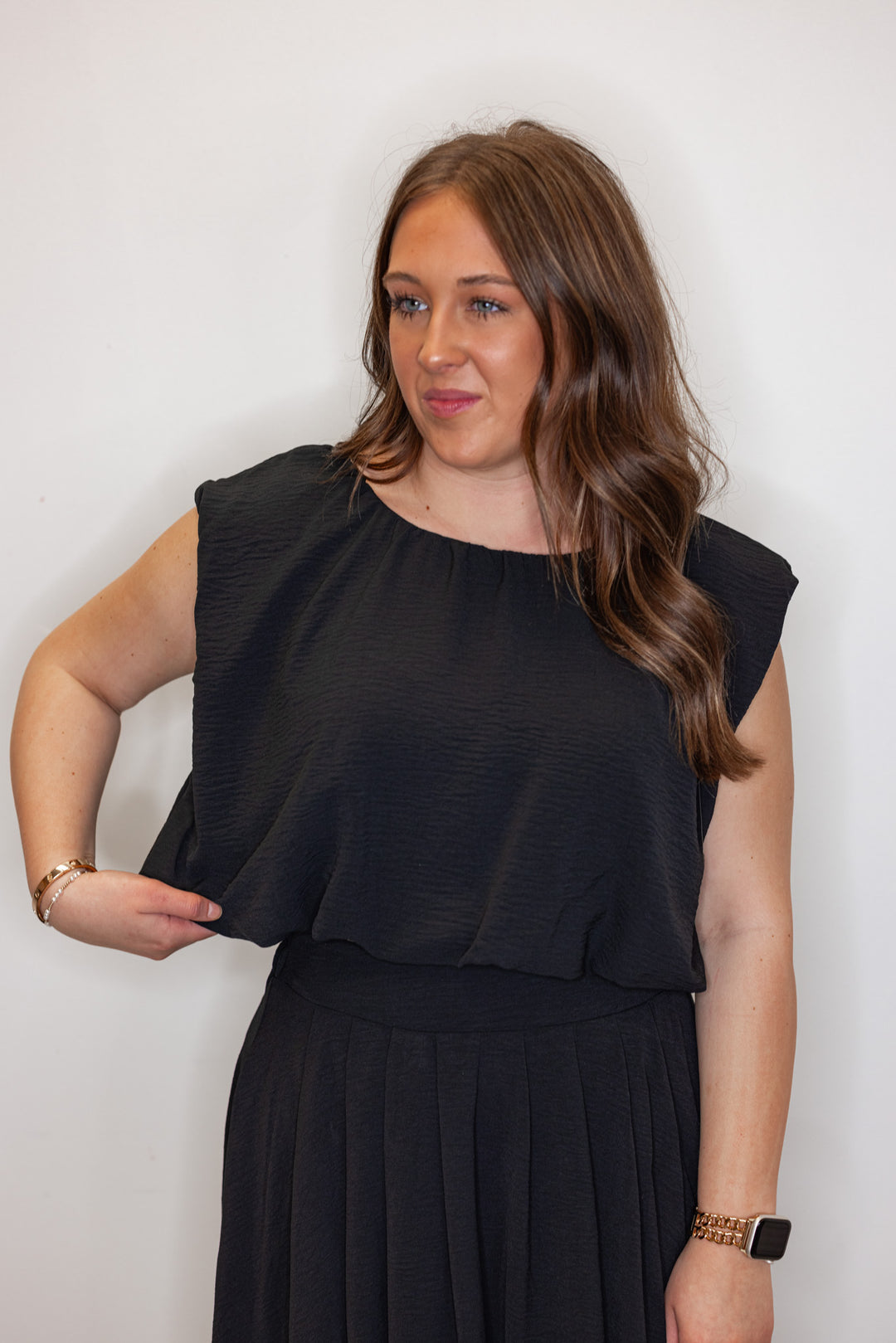 dressy black bubble hem top
