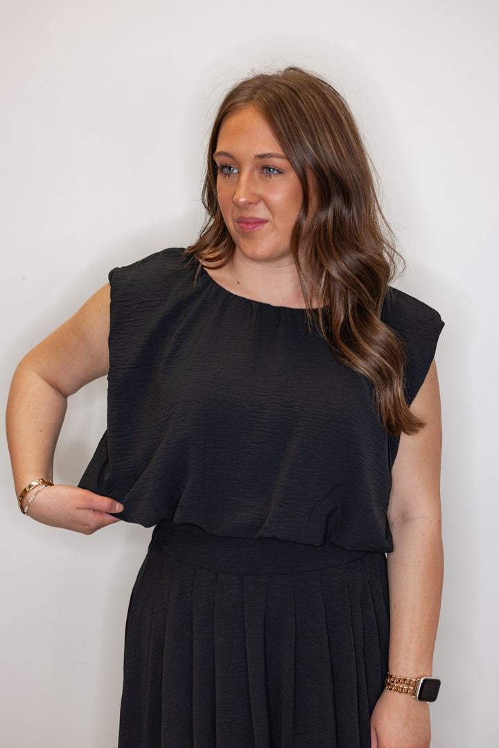 dressy black bubble hem top