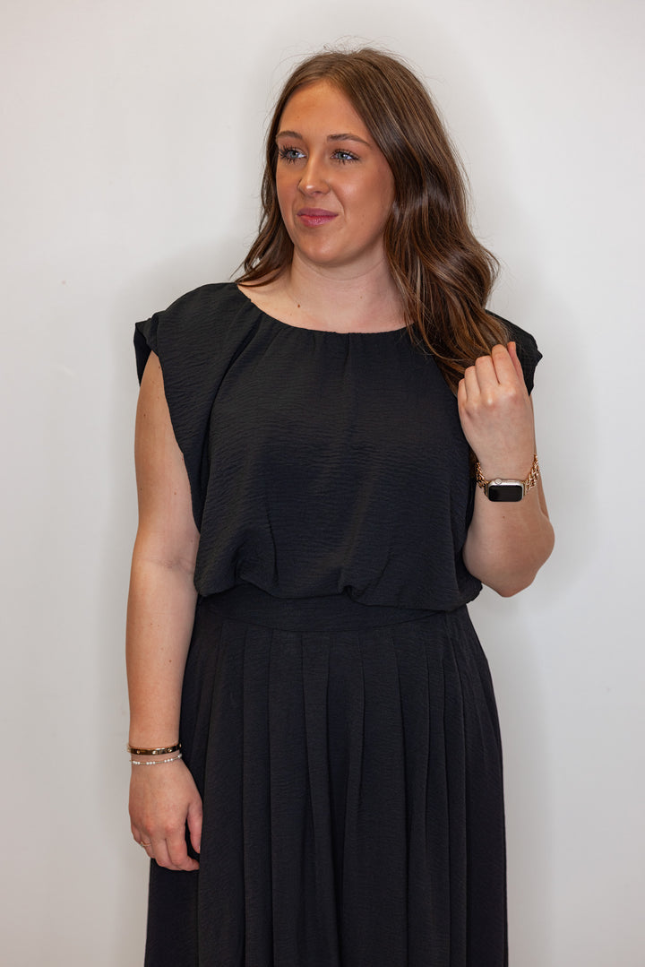 dressy black bubble hem top