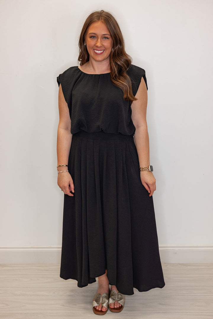 dressy black bubble hem top