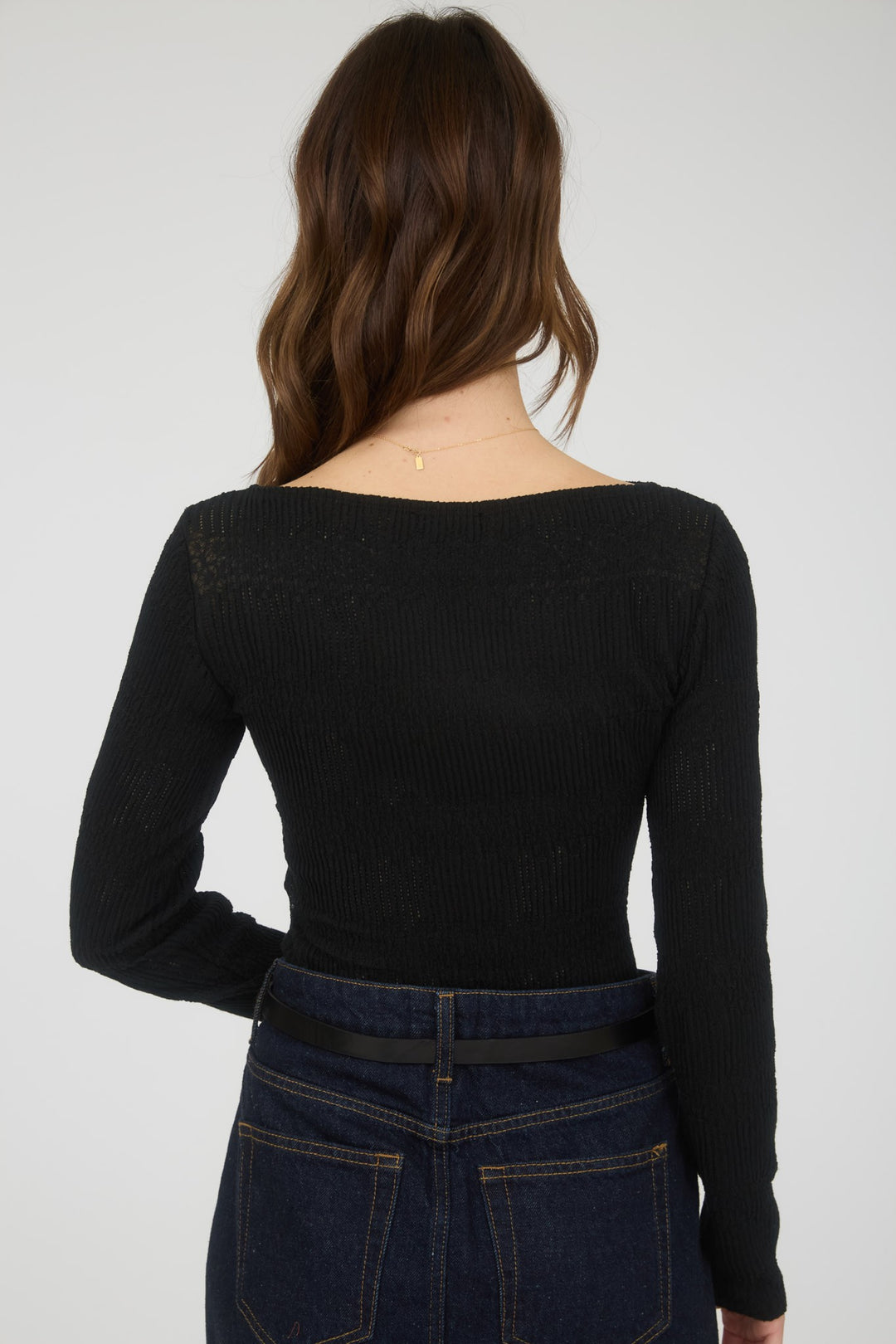Women's black ribbed knit fitted top with trendy boat neck by Blu Pepper showing back view