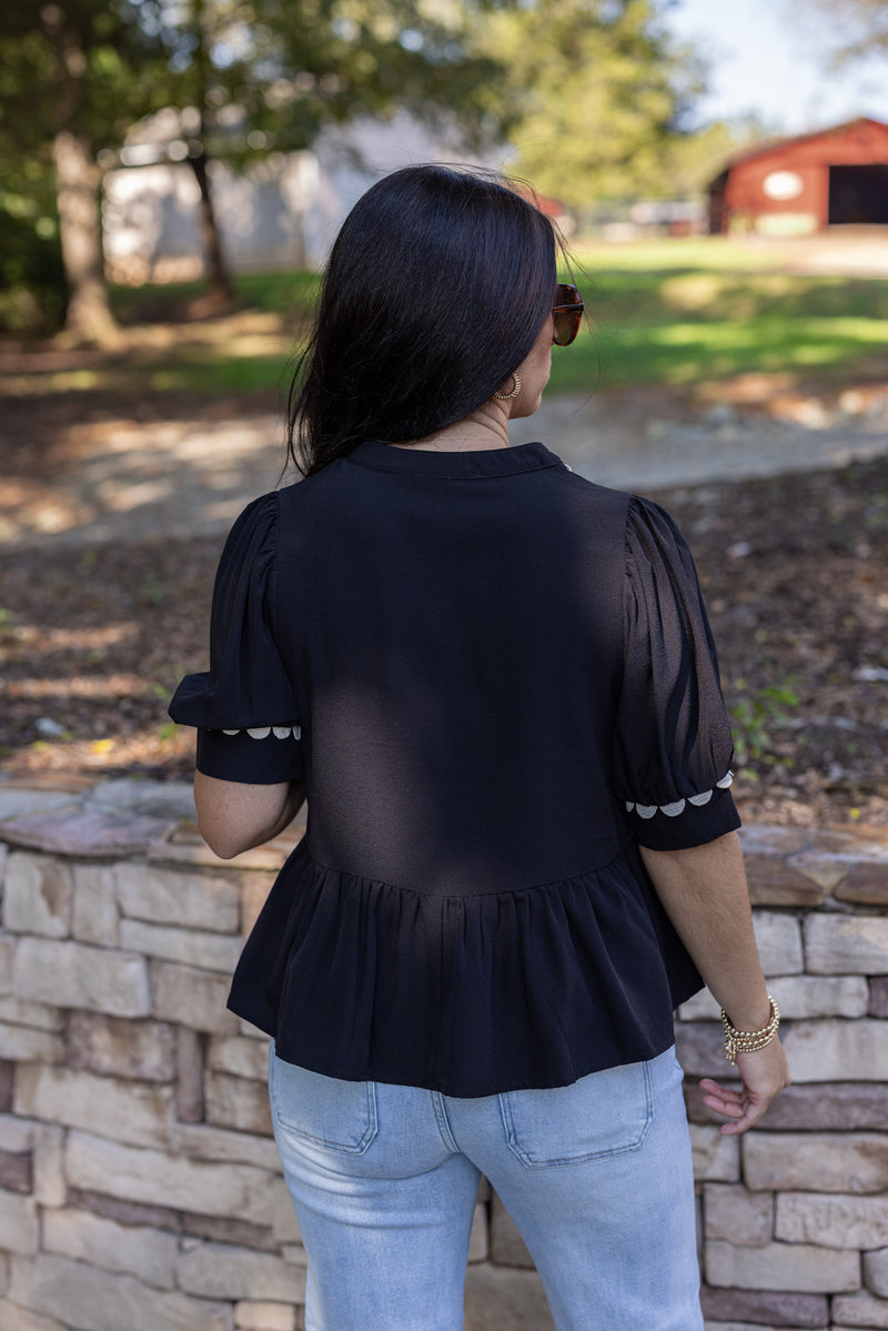 black-ricrac-peplum-top