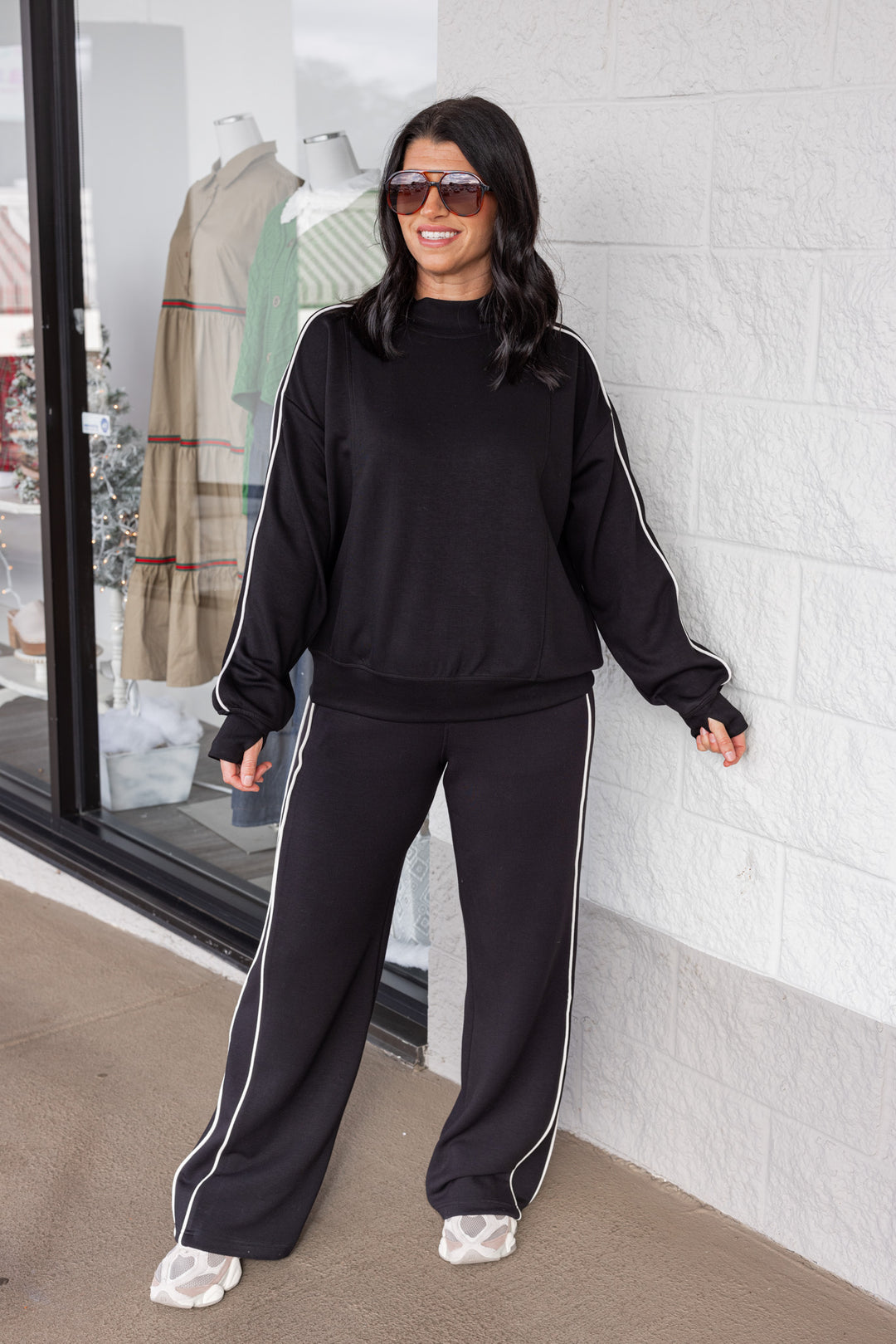 Women's black scuba knit mock neck top by Rae Mode, perfect for running errands