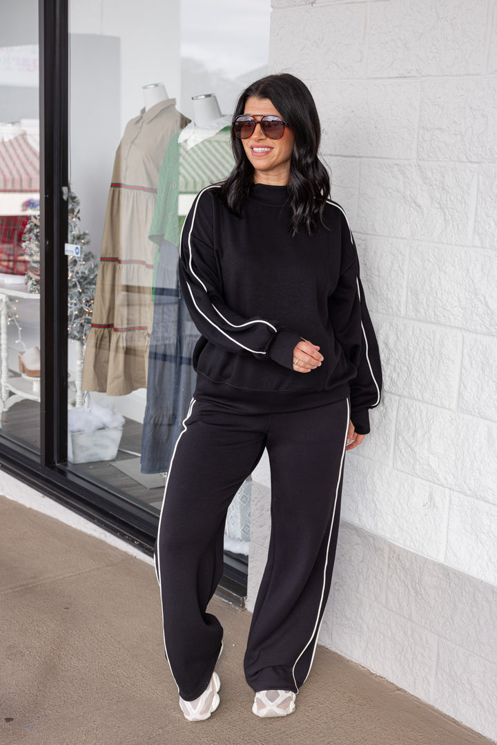 Women's black scuba knit straight leg elastic waist pants by Rae Mode