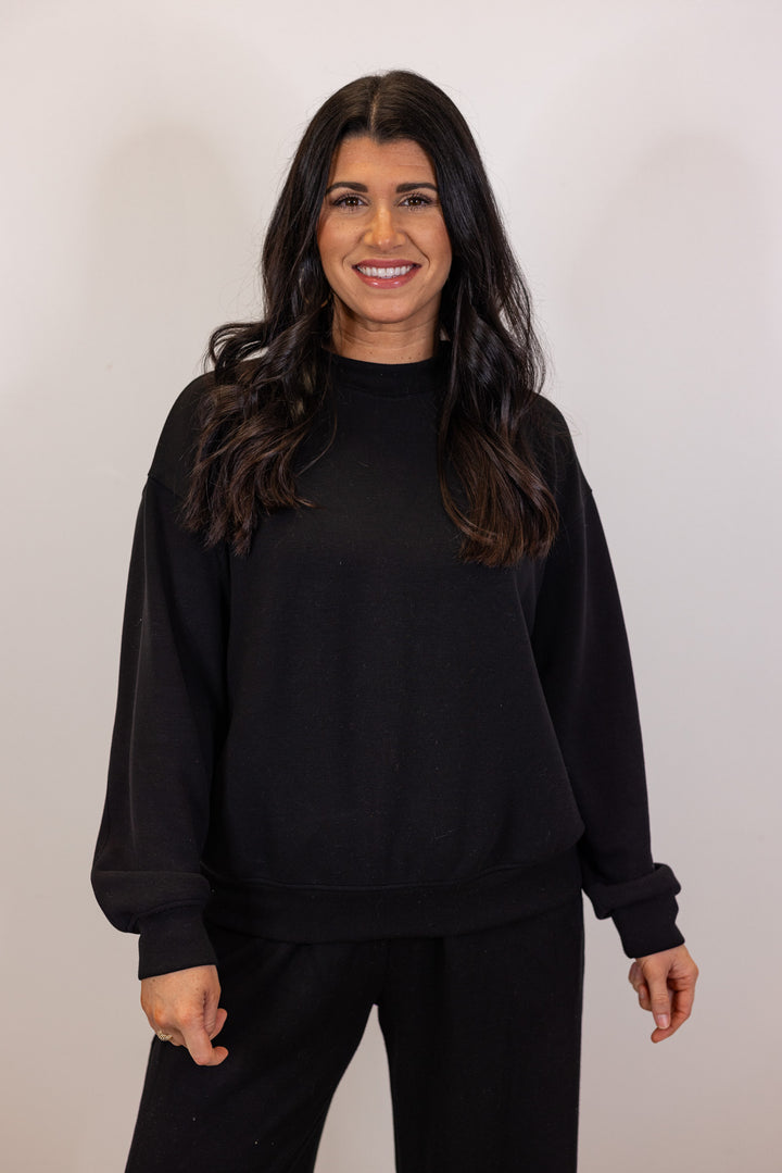 Black scuba knit mock neck pullover top by Rae Mode