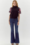 Jodifl Black knit mock neck top with multicolor sequin floral puff sleeves