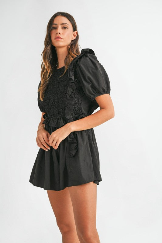 Mable Black smocked romper with ruffle trim