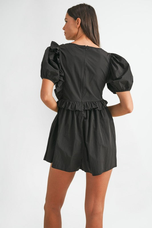 Mable Black smocked romper with ruffle trim