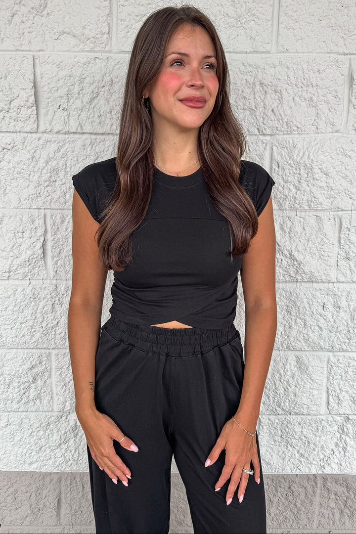 solid black sleeveless crew neckline top and jogger pants matching athleisure set
