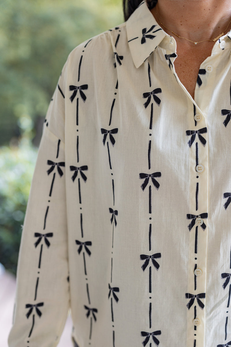 ivory black bow printed button down top