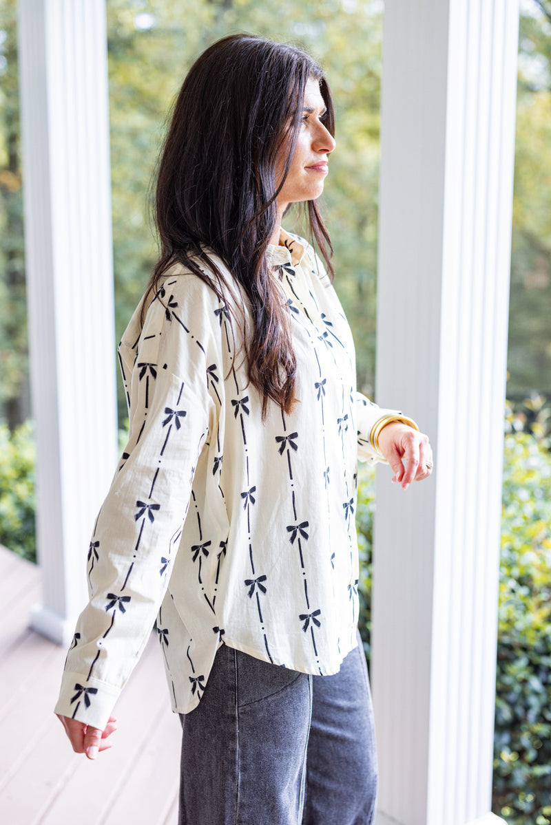 ivory black bow printed button down top